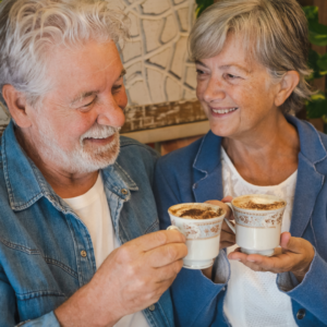portrait of a lovely senior couple inside a coffee shop